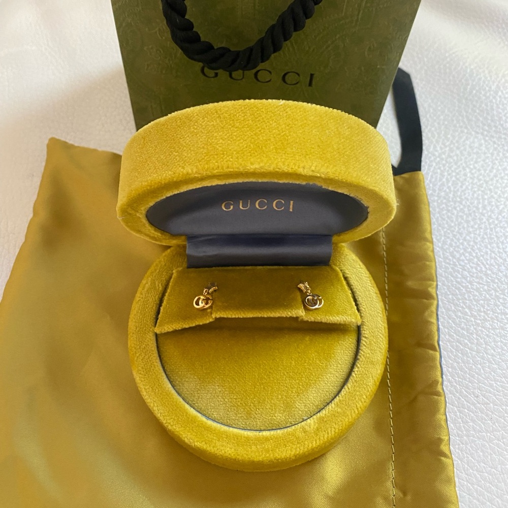 Gucci running 18k earrings